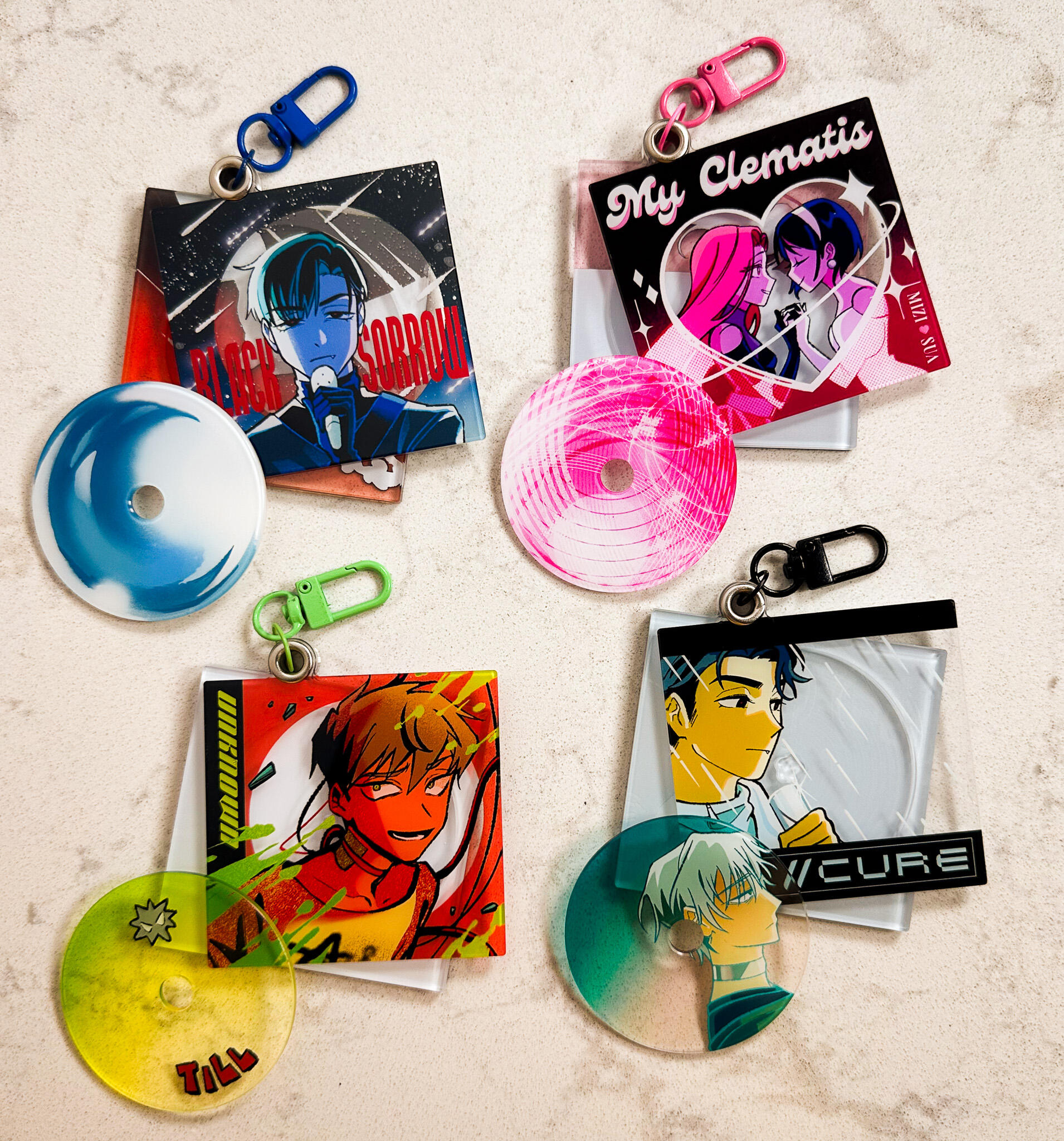 Alien Stage CD Charms (the charms swivel open and the CD inside is removeable)